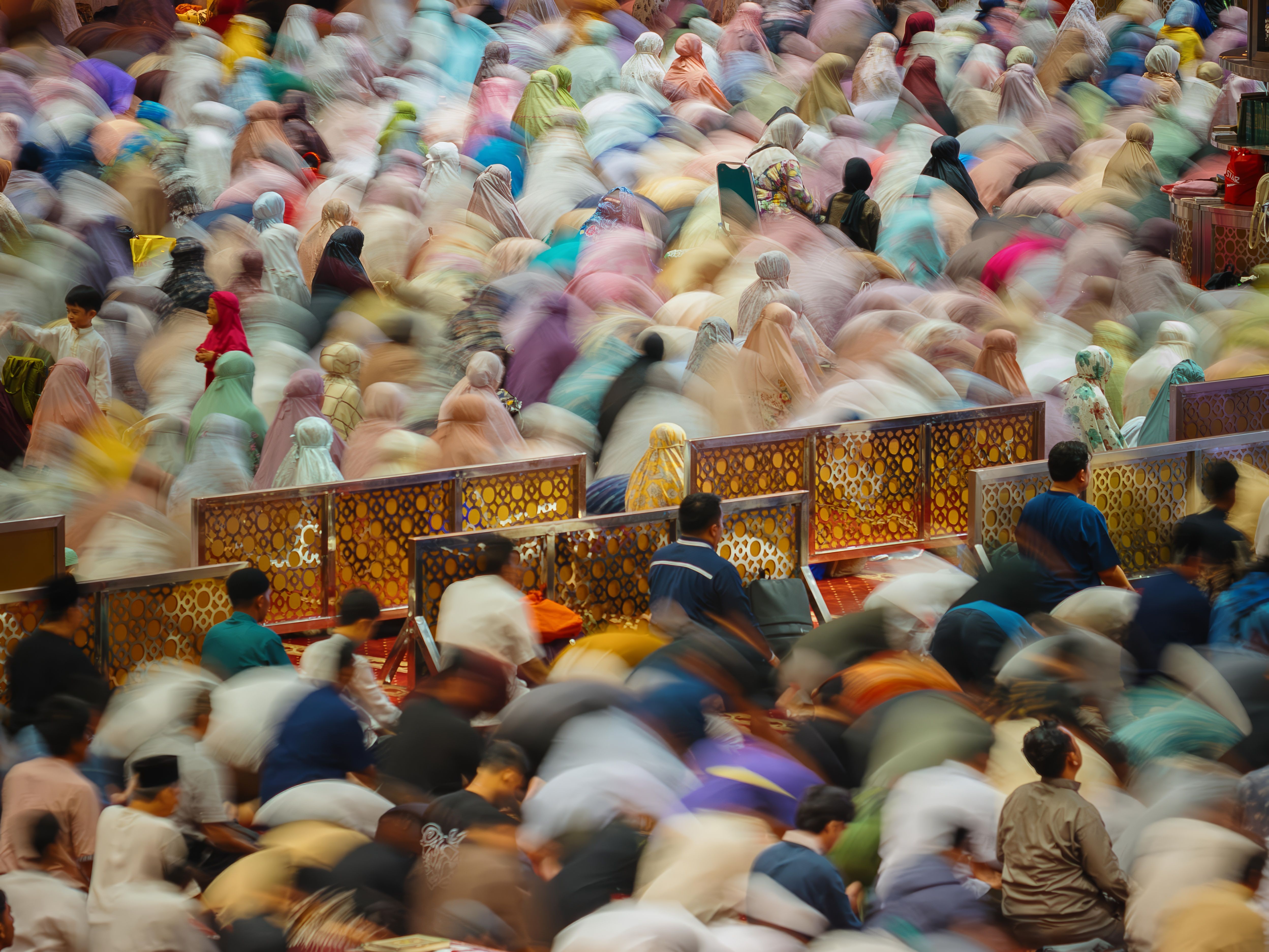 Vibrant Muslim Congregation Praying in Mosque · Free Stock Photo