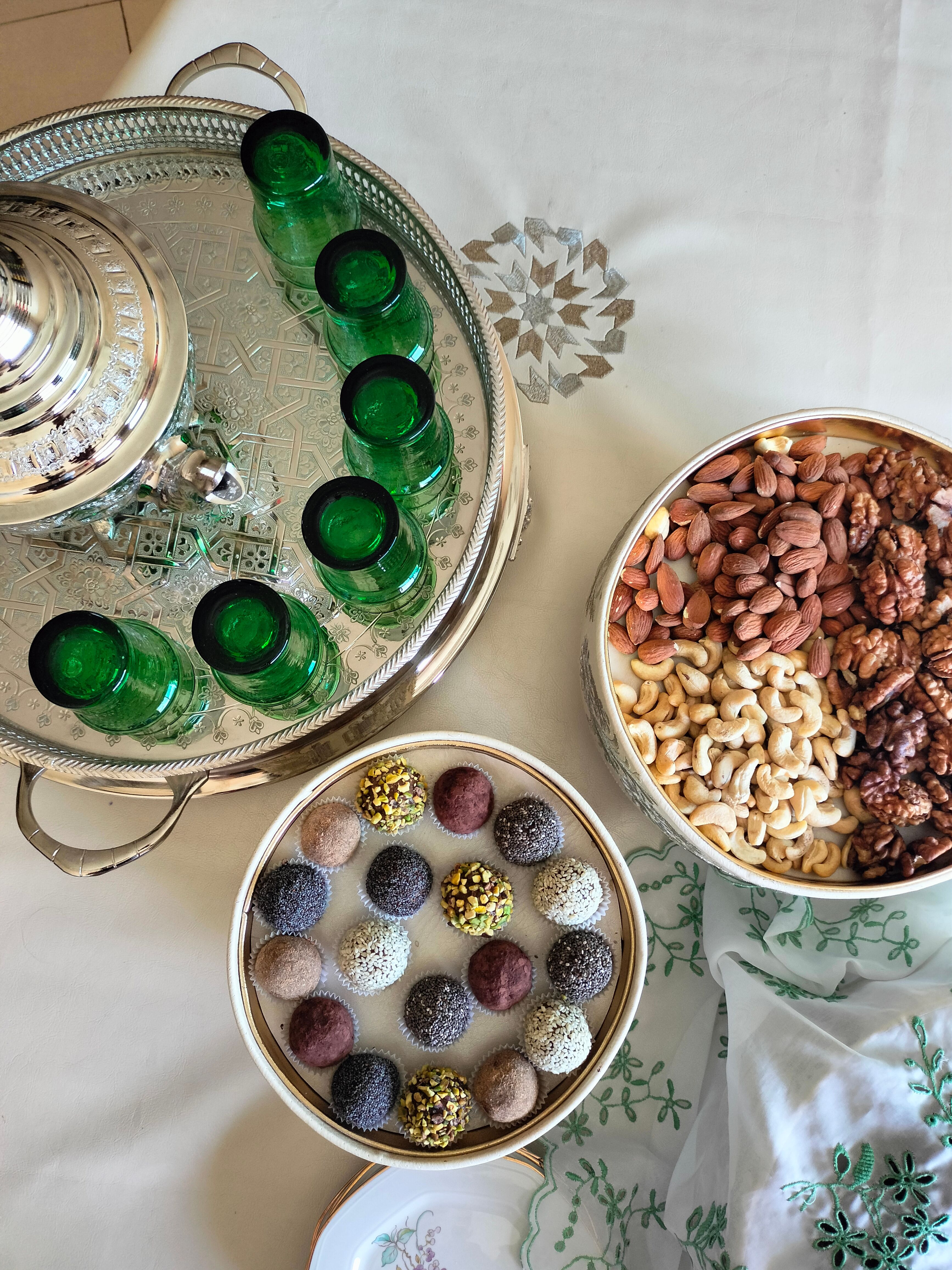 Traditional tea setup with sweets and nuts · Free Stock Photo