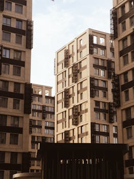 High-rise modern apartment buildings captured in a daylight setting showcasing urban architecture.