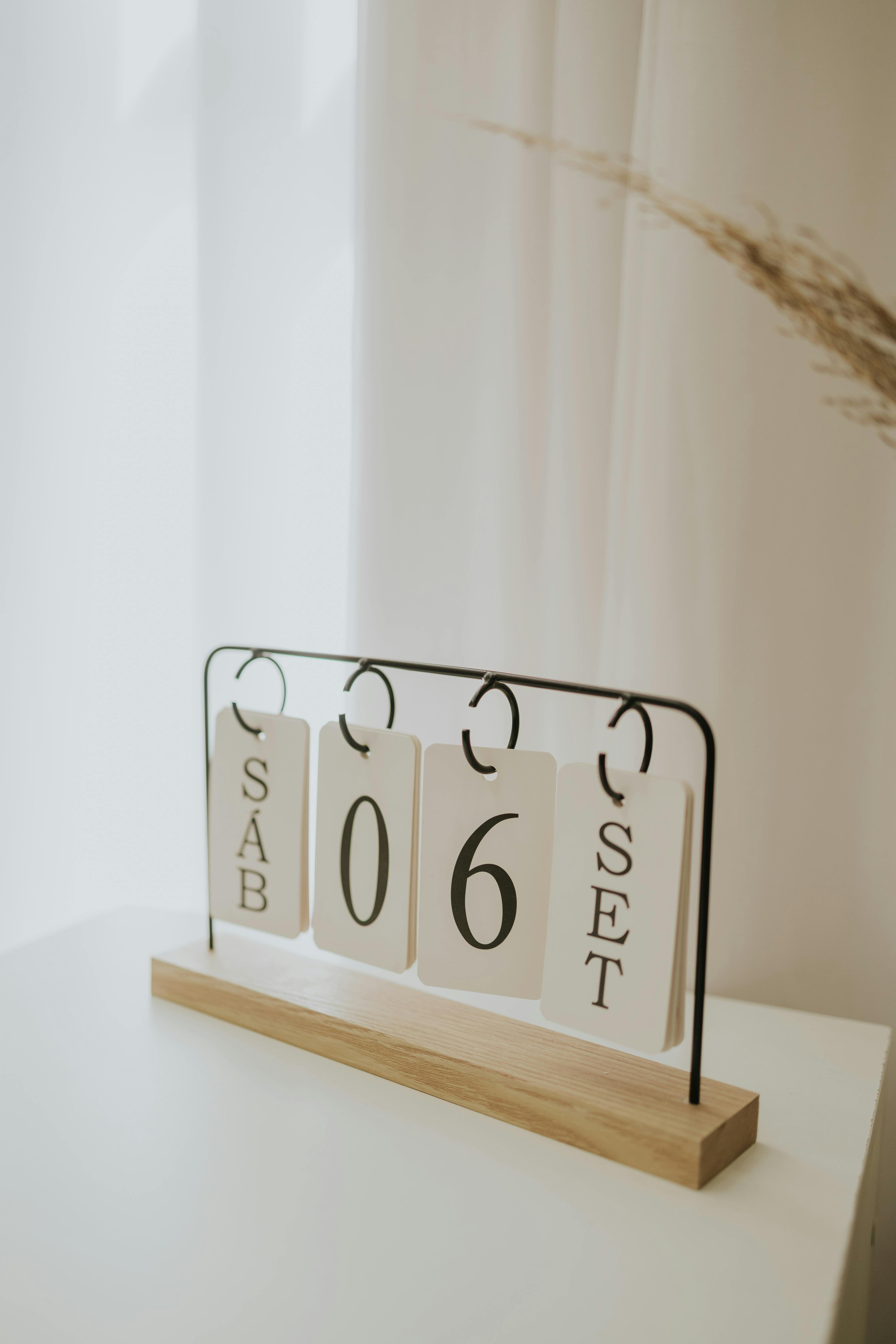 Free A minimalist desk calendar showing September 6th in soft natural lighting, perfect for office decor inspiration. Stock Photo