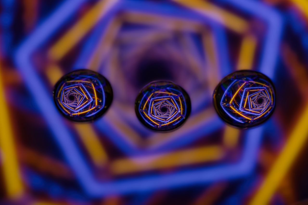 vibrant abstract photo showcasing water droplets with colorful geometr