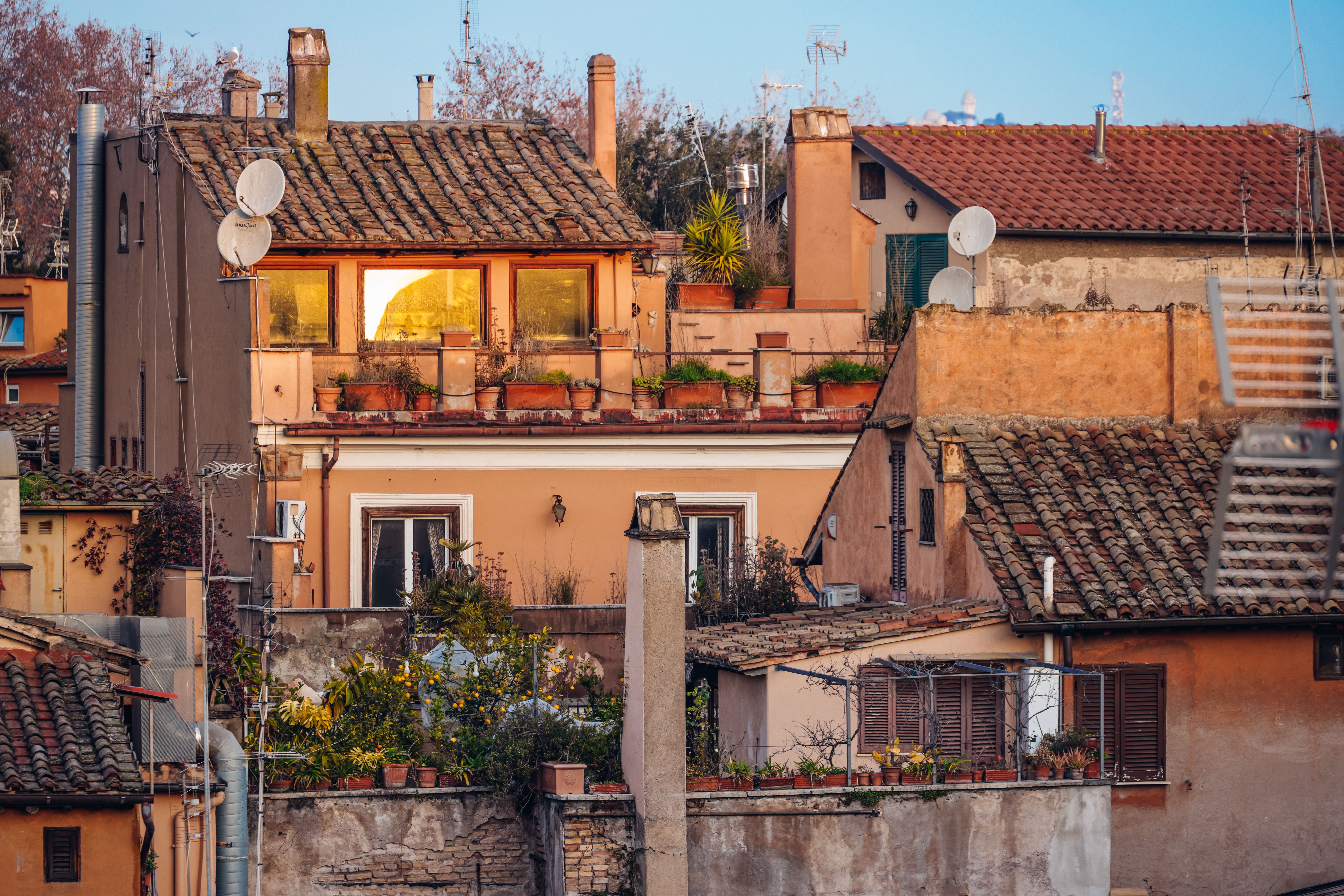 Aerial View of Charming Italian Rooftops at Sunset · Free Stock Photo