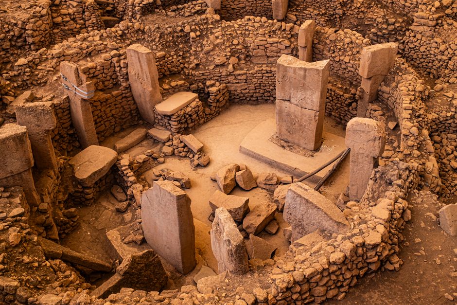 Explore the ancient stone structures of Göbekli Tepe, a prehistoric archaeological site in Turkey.
