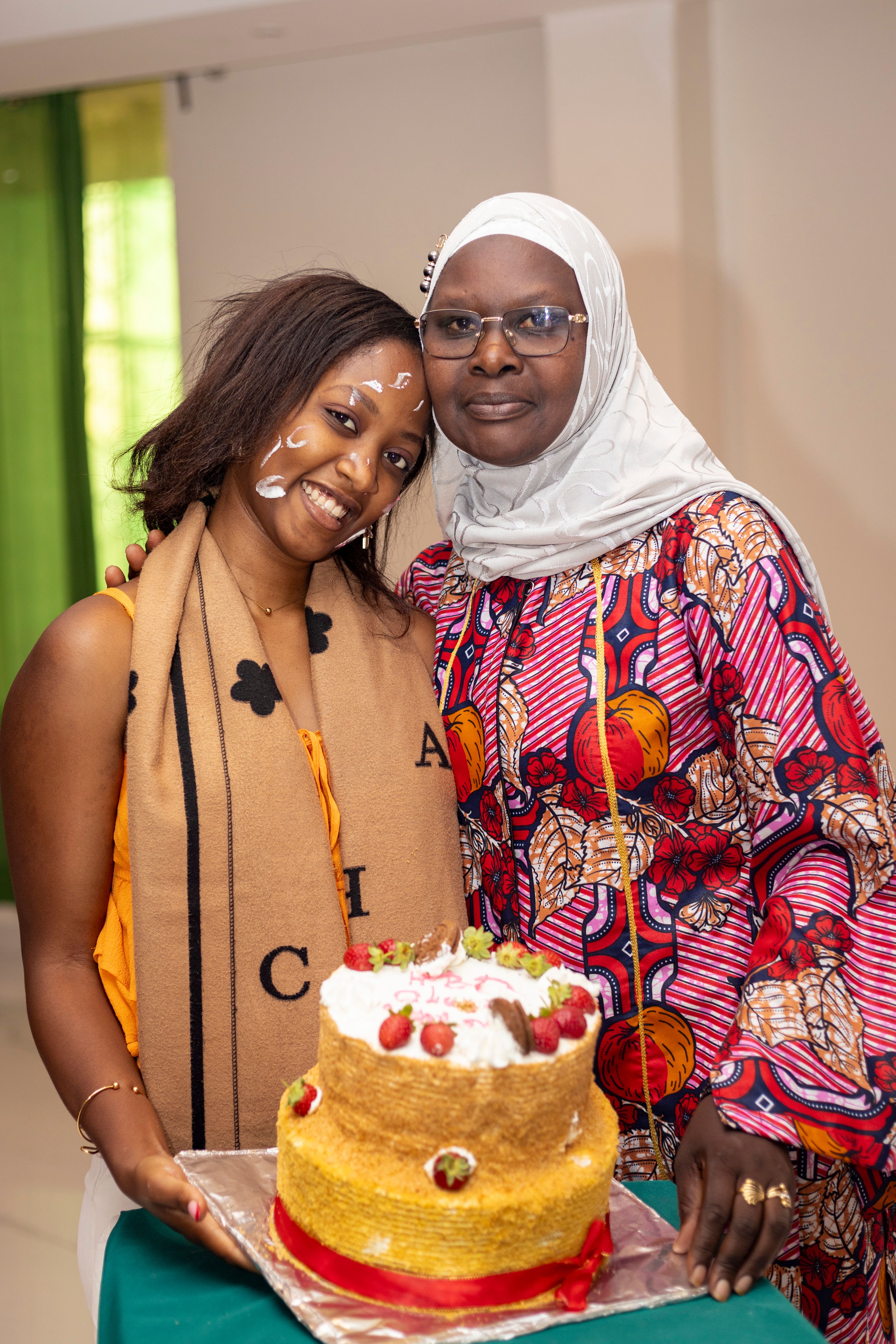 Joyful Celebration with Cake in Kigali Rwanda · Free Stock Photo