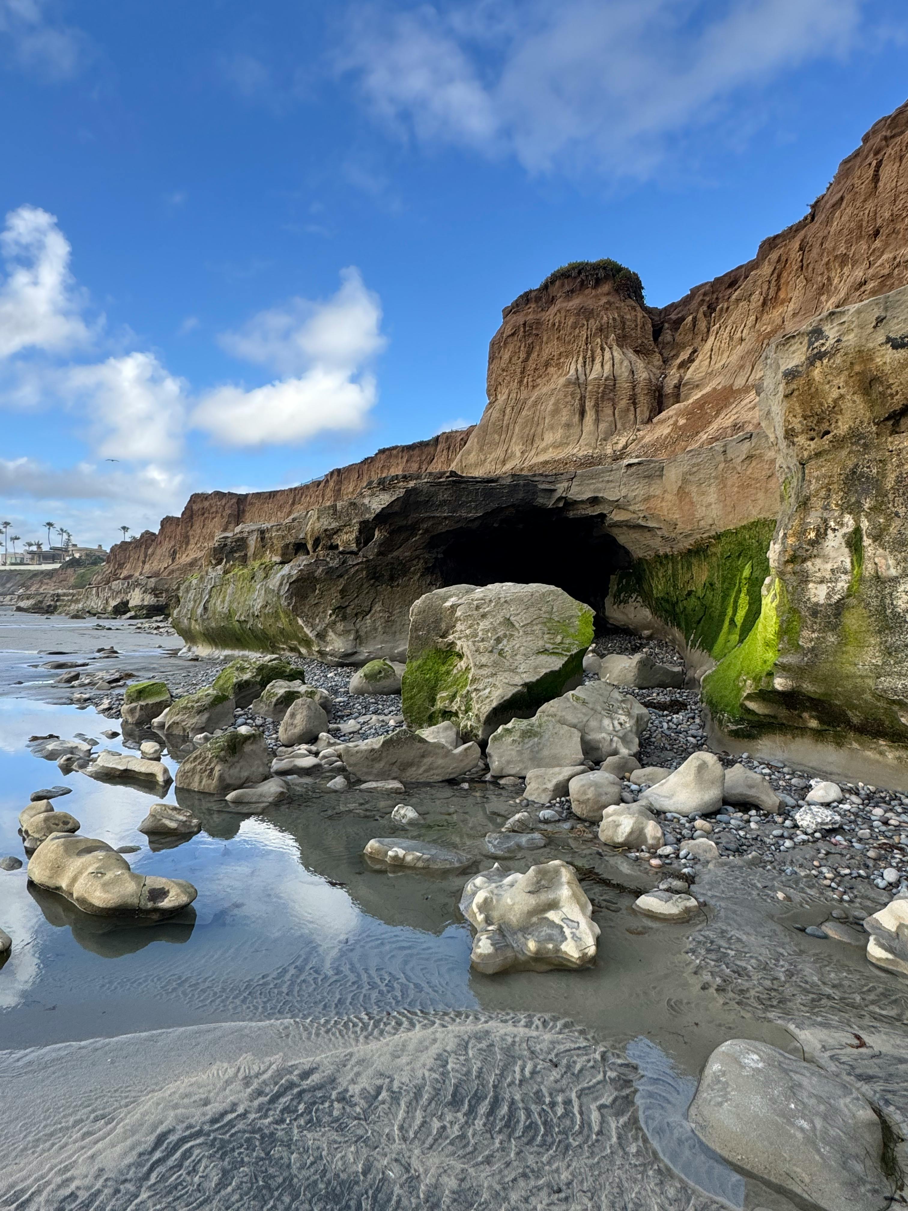 Stunning view of rocky cliffs and coastal scenery at Carlsbad Beach, California.
