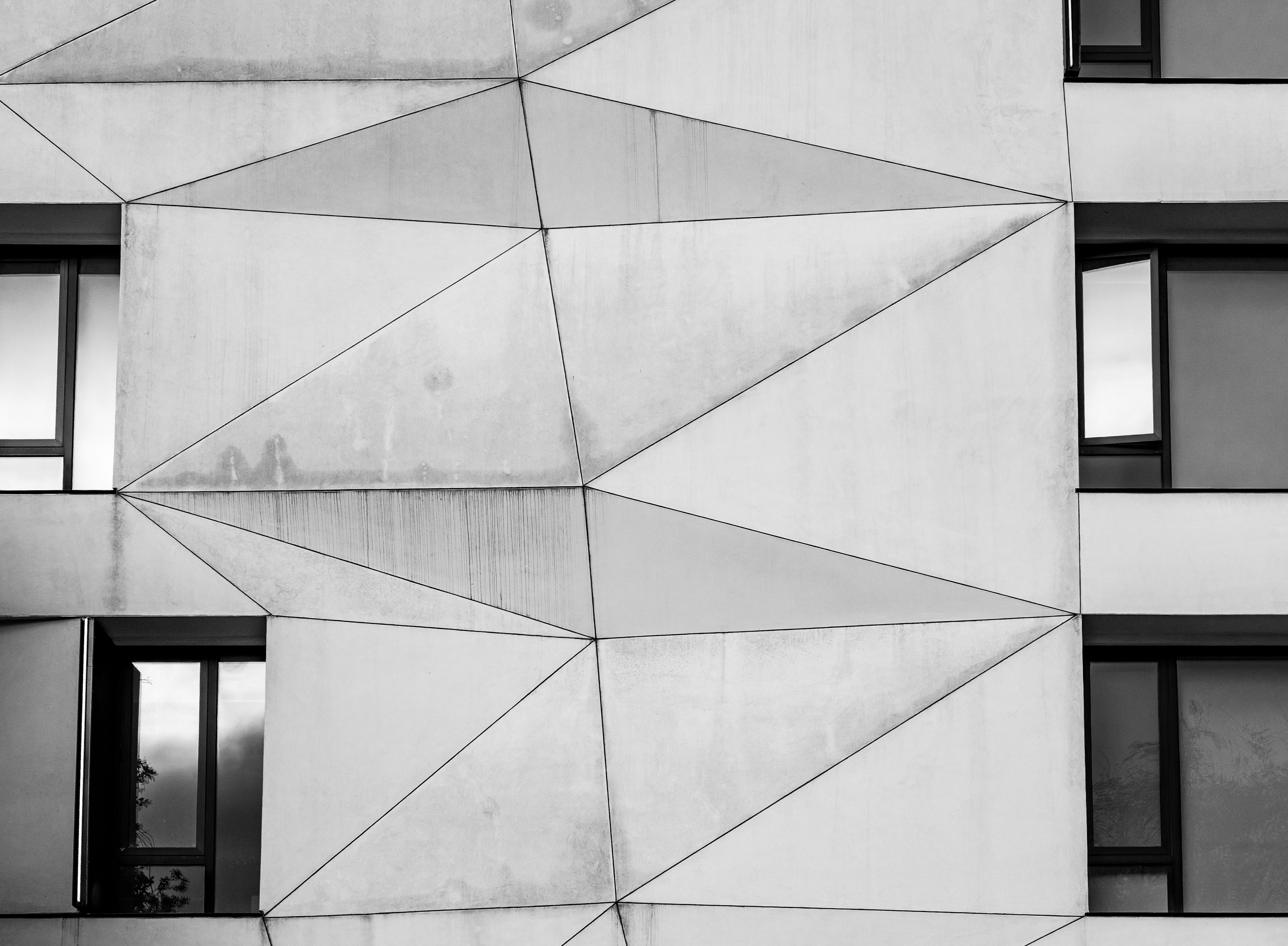 Modern Geometric Building Facade in Black and White · Free Stock Photo