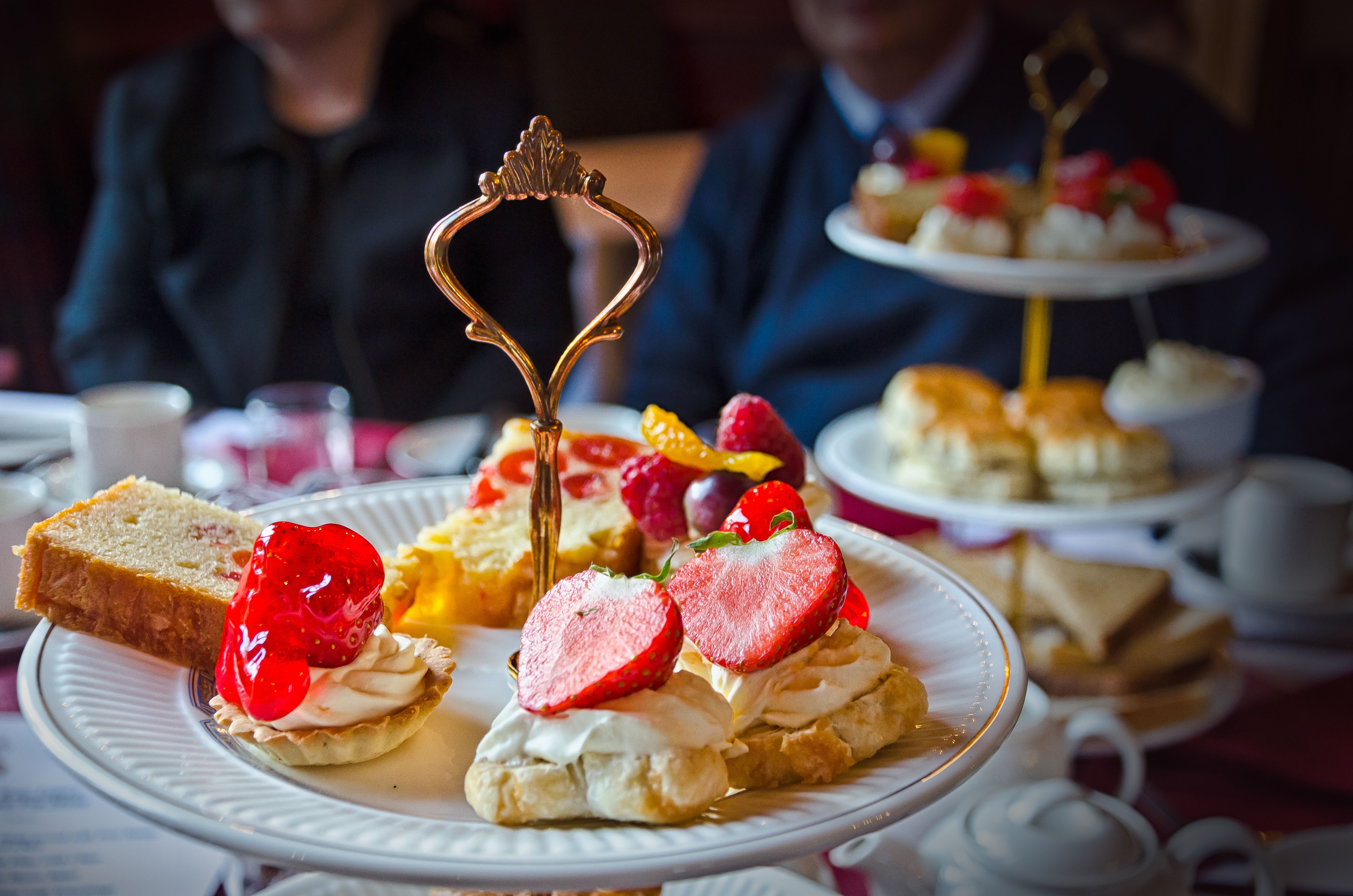 Elegant Afternoon Tea with Assorted Desserts · Free Stock Photo