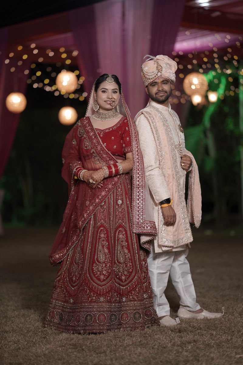 Elegant Indian Wedding Couple in Traditional Attire · Free Stock Photo