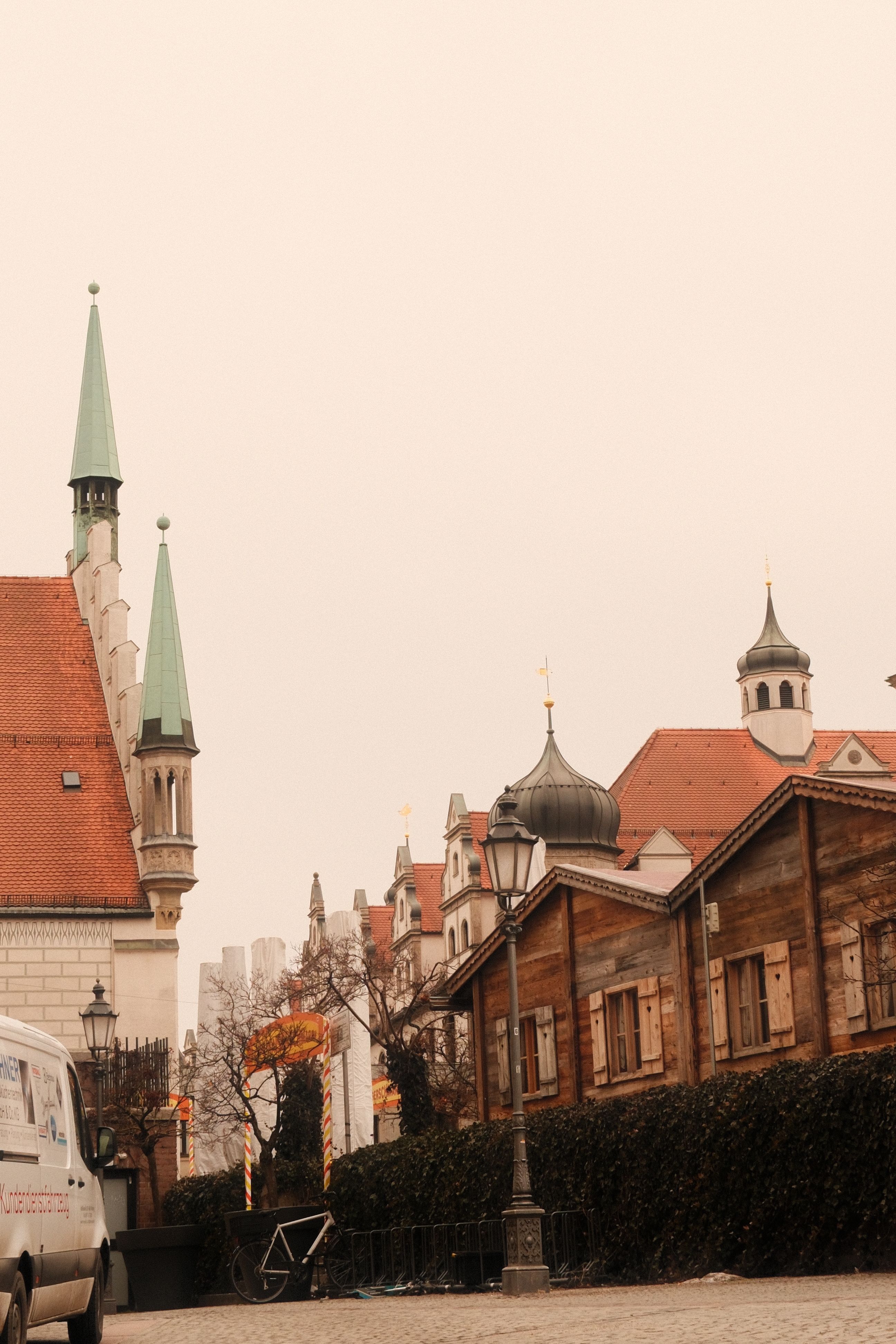 Capture of traditional Bavarian buildings in a Munich street during autumn.