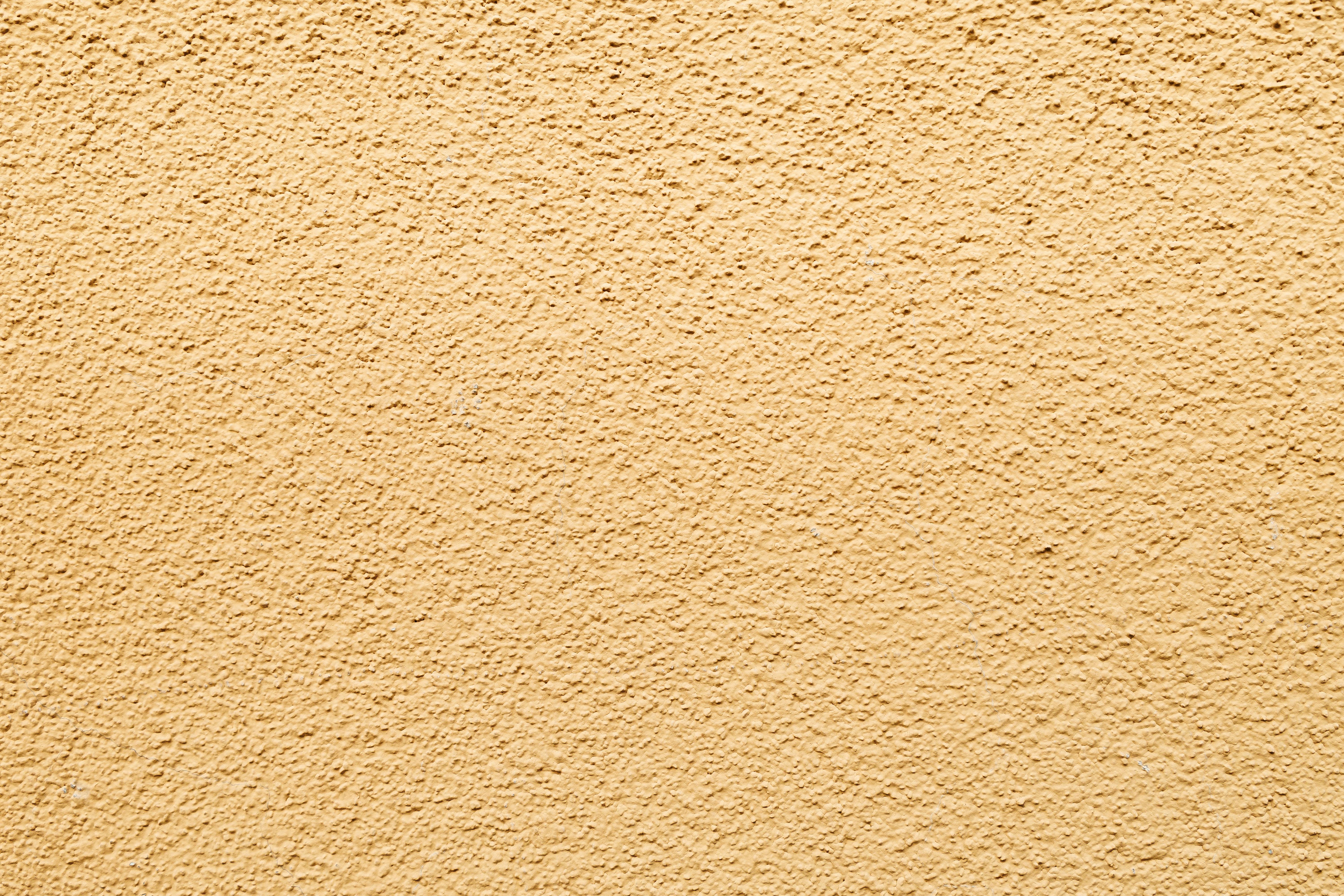 Kostenlos Hochauflösendes Bild einer strukturierten, hellgelben Wand, perfekt als Hintergrund geeignet. Stock-Foto