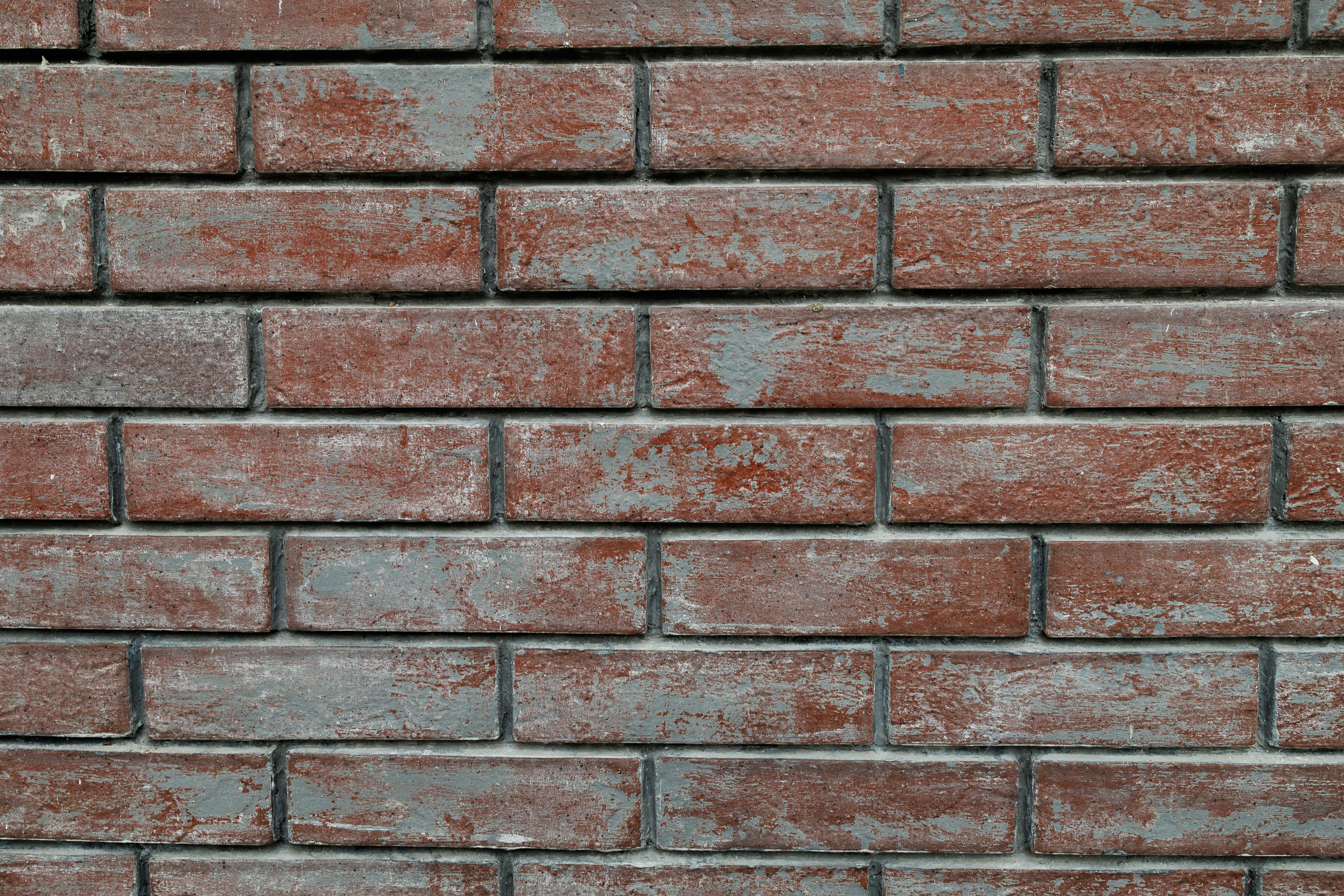 無料 背景やデザイン プロジェクトに最適な、赤レンガの壁のテクスチャの高解像度画像。 写真素材