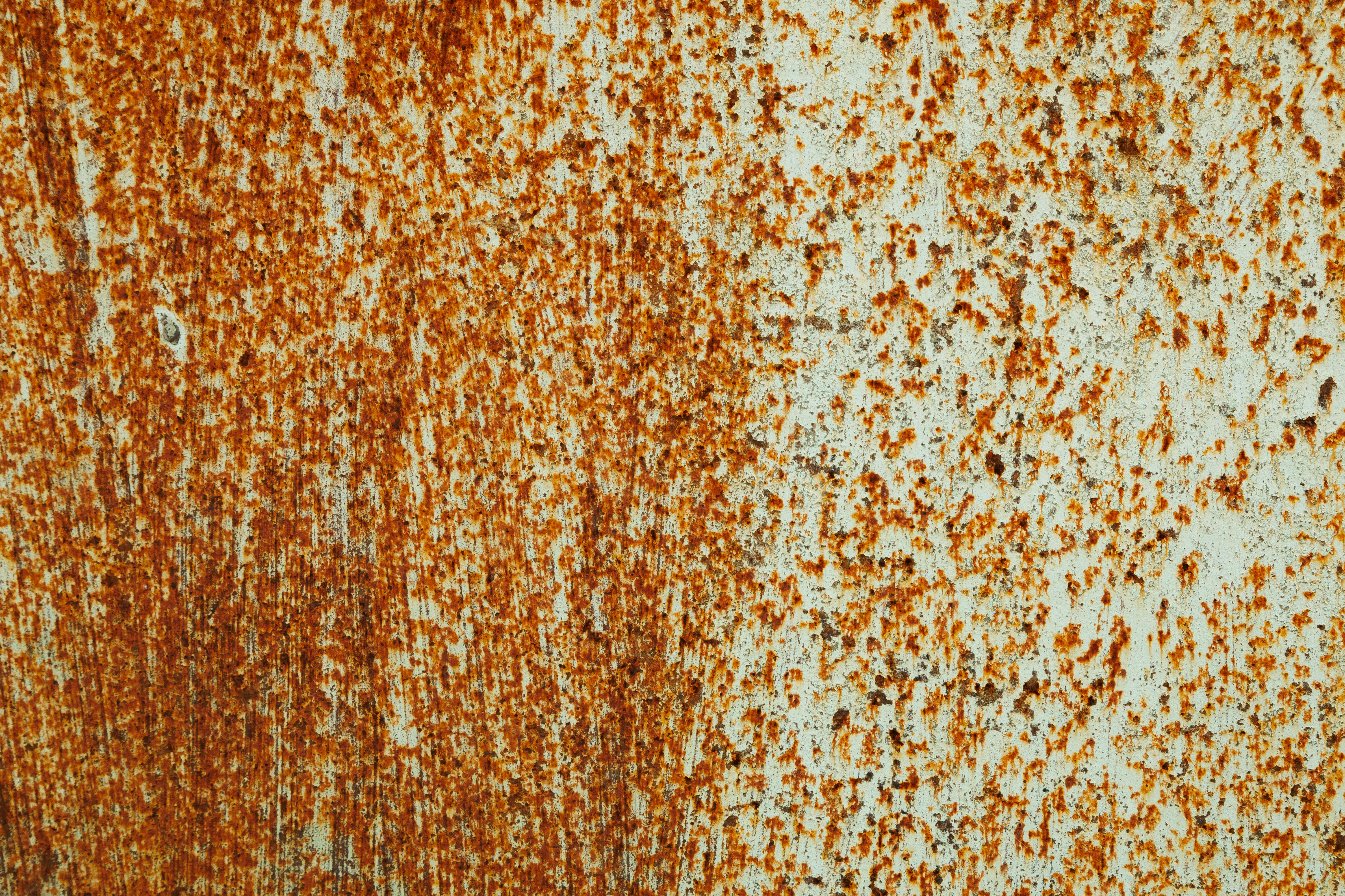 De franc Primer pla detallat d'una superfície metàl·lica rovellada que mostra textures i patrons. Foto d'estoc