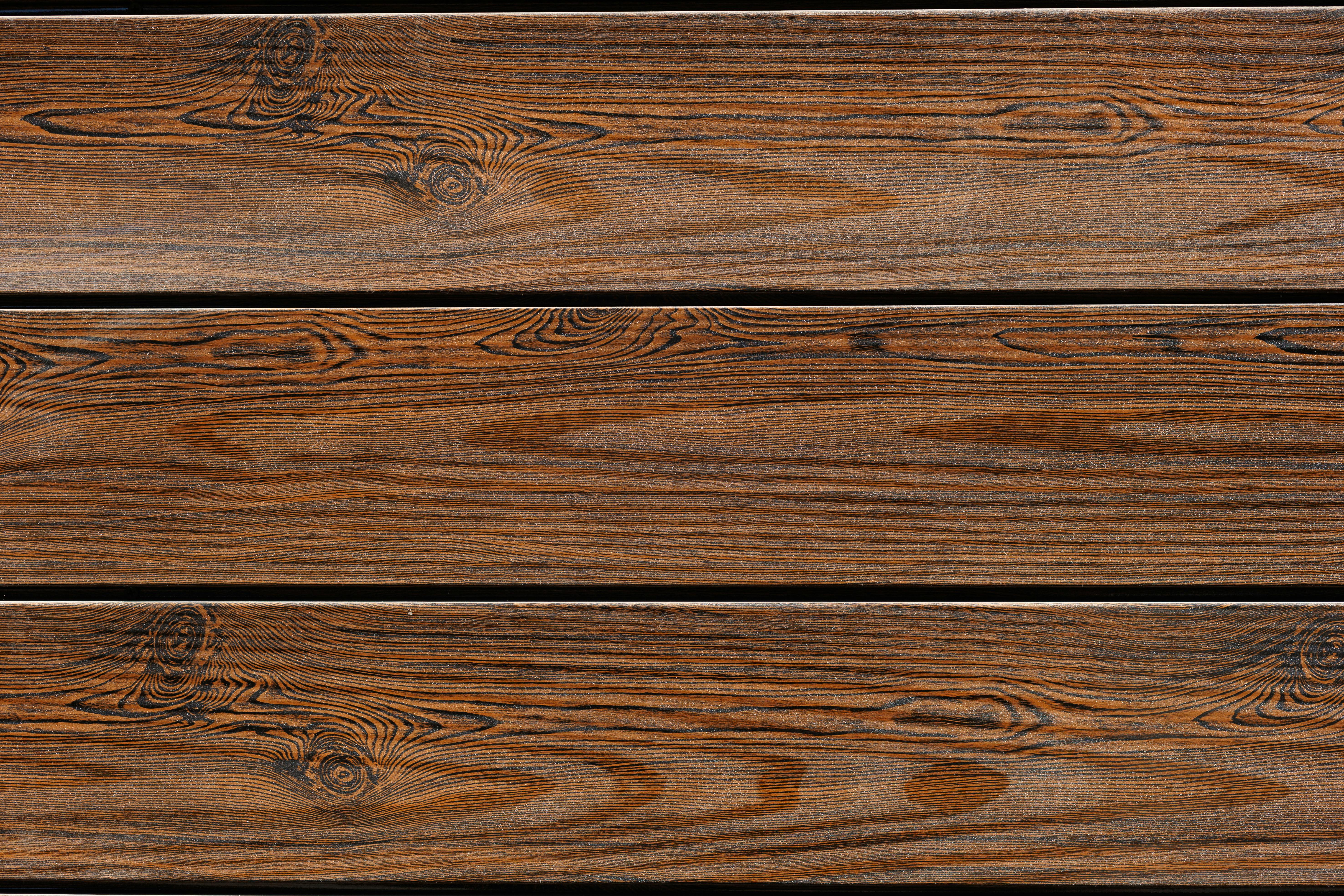 Gratis Nærbilde av treplanker som viser detaljert trestruktur for bakgrunn eller materialdesign. Arkivbilde