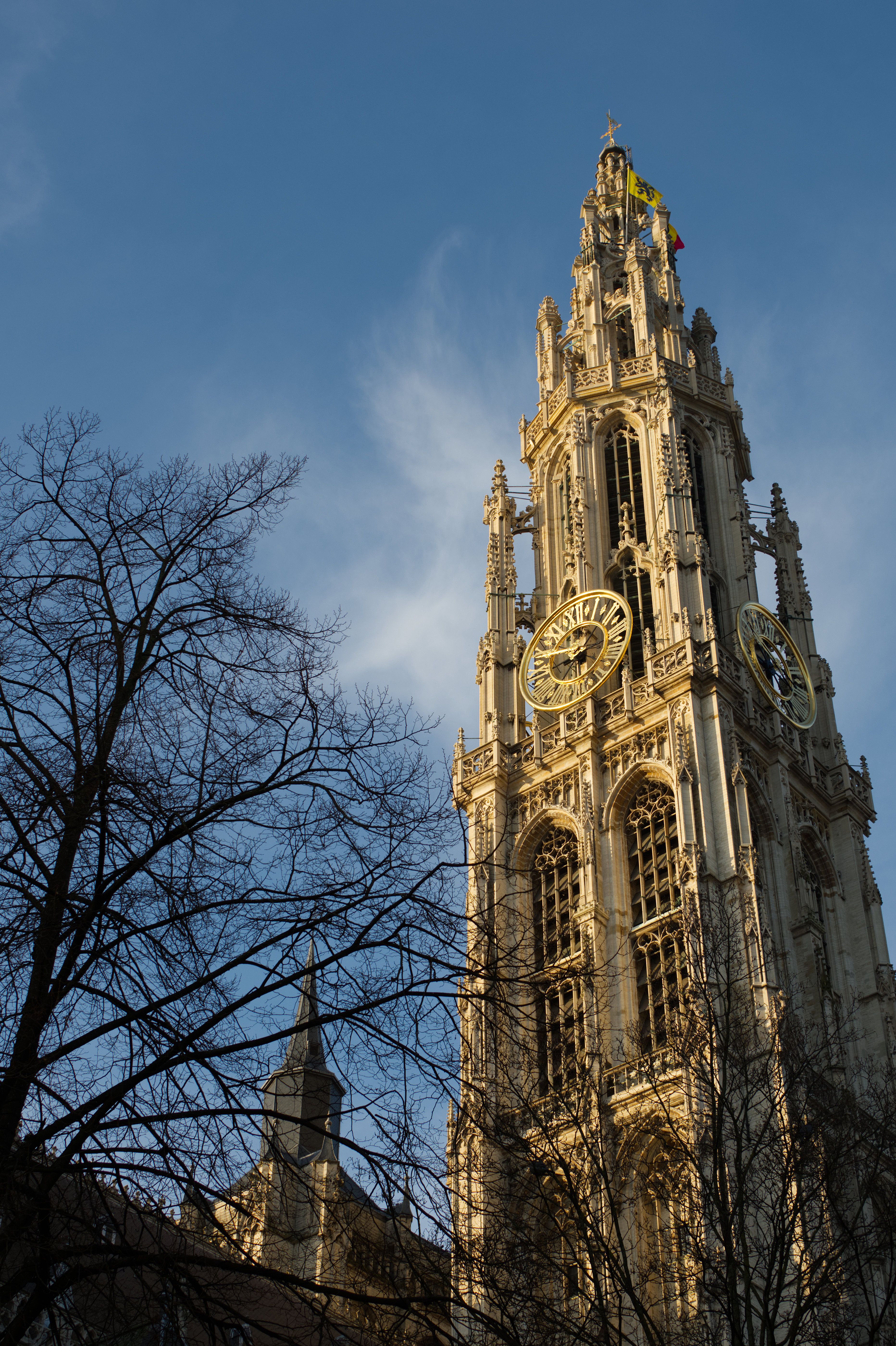 Gothic Cathedral Tower Against Clear Blue Sky · Free Stock Photo