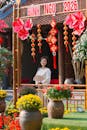 Woman Celebrating Vietnamese New Year in Traditional Decor