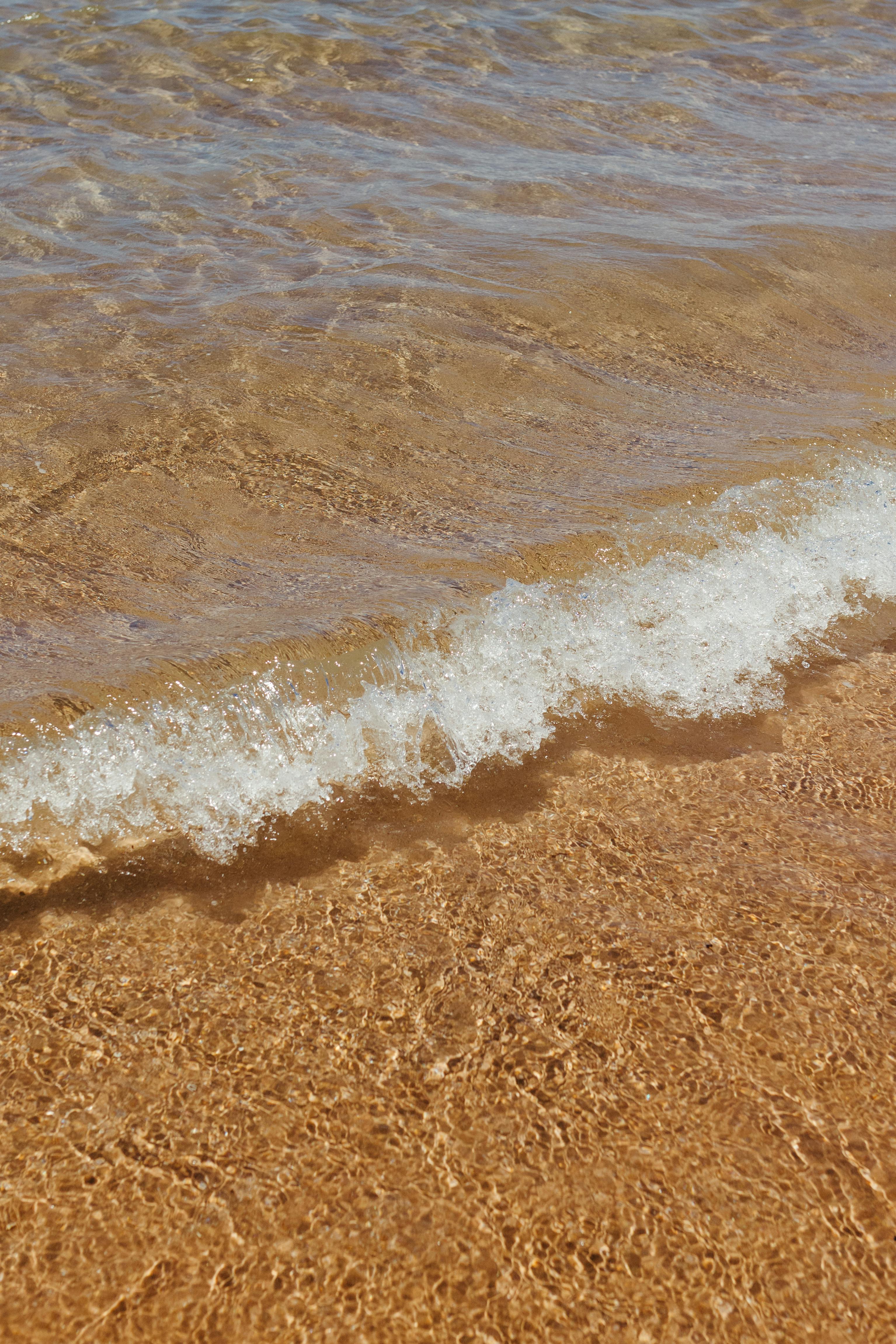 Δωρεάν Γαλήνια παραλία με απαλά κύματα που χαϊδεύουν τη χρυσή άμμο, ιδανική για θέματα χαλάρωσης. Φωτογραφία από στοκ φωτογραφιών