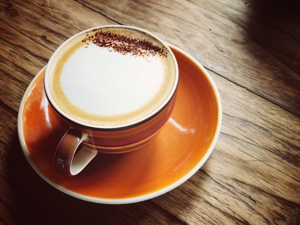 Brown Ceramic Coffee Mug on Saucer