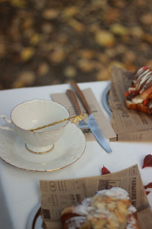 Free Elegant tea setup outdoors with pastries and golden spoon in Türkiye. Stock Photo