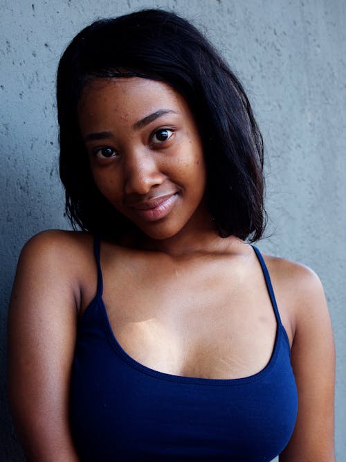 Woman in Blue Tank Top