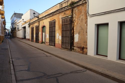Free Rustic street with historic buildings in El Puerto de Santa María, Spain. Stock Photo