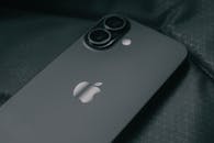 Close-Up Shot of Smartphone on Dark Fabric