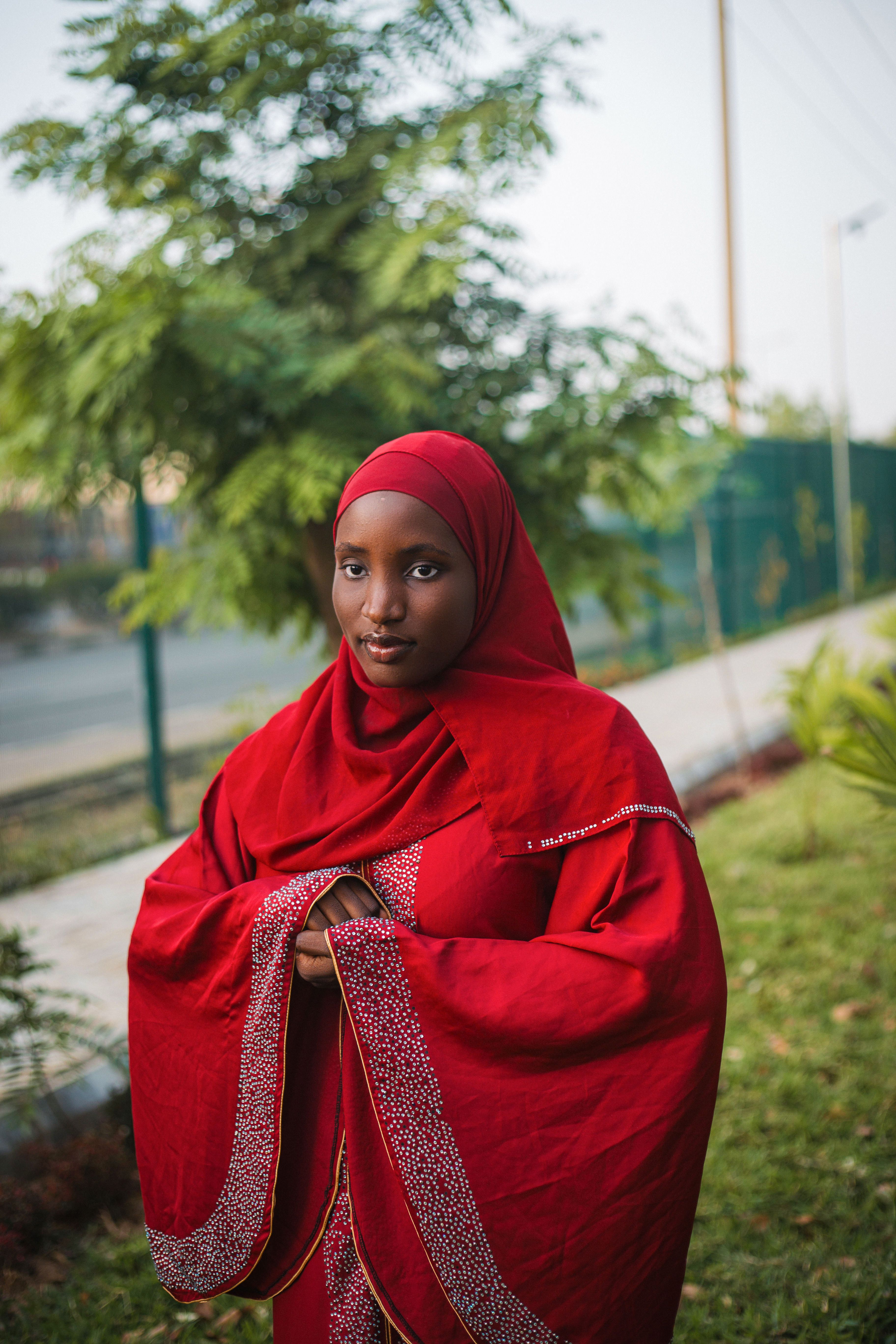 Young Woman in Red Hijab Outdoors · Free Stock Photo