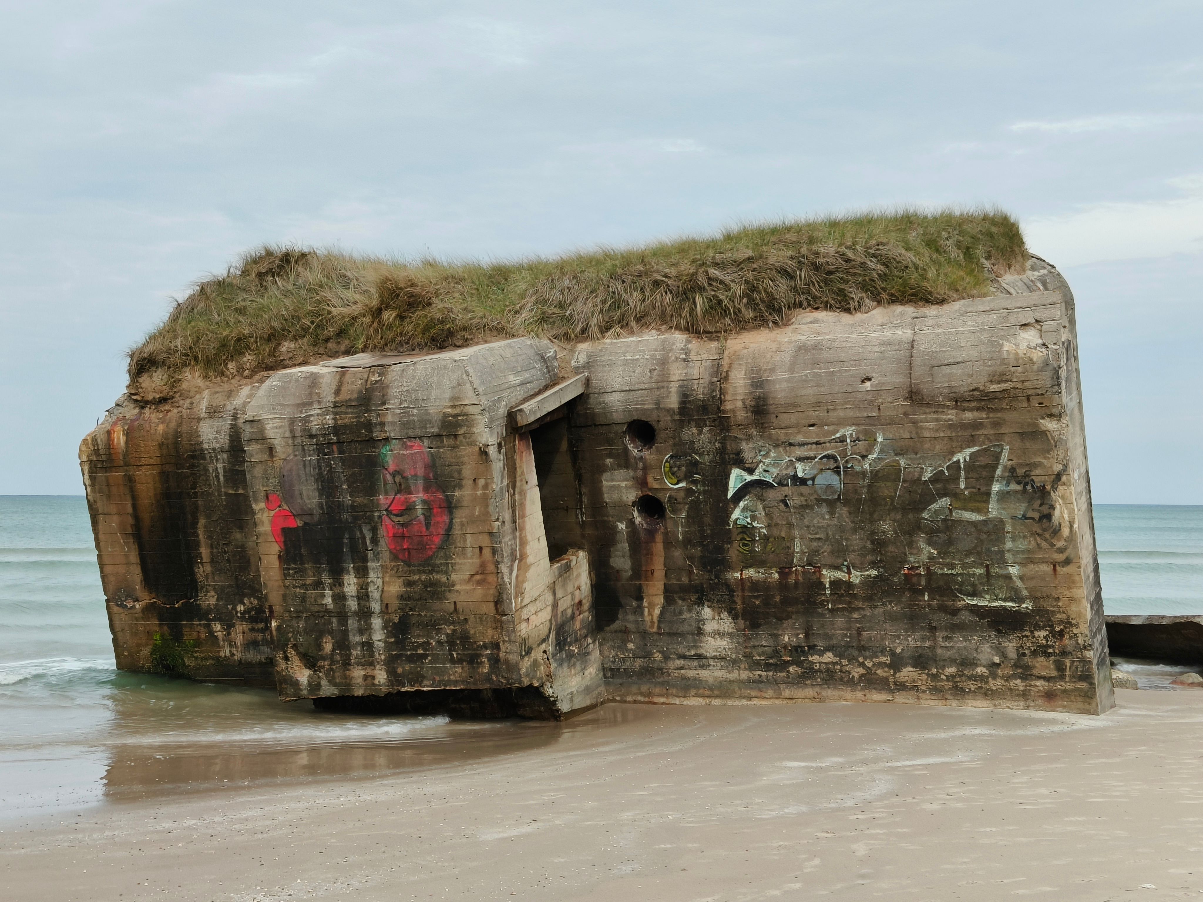 Rustic WWII Bunker on Løkken Beach, Denmark · Free Stock Photo