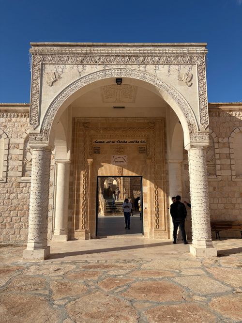 Free Beautiful stone architecture with ornate carvings in a historical setting in Mardin, Turkey. Stock Photo