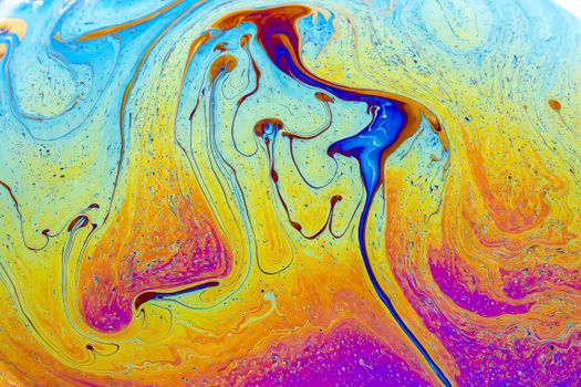 Colorful abstract design with swirling liquid patterns in vibrant hues.