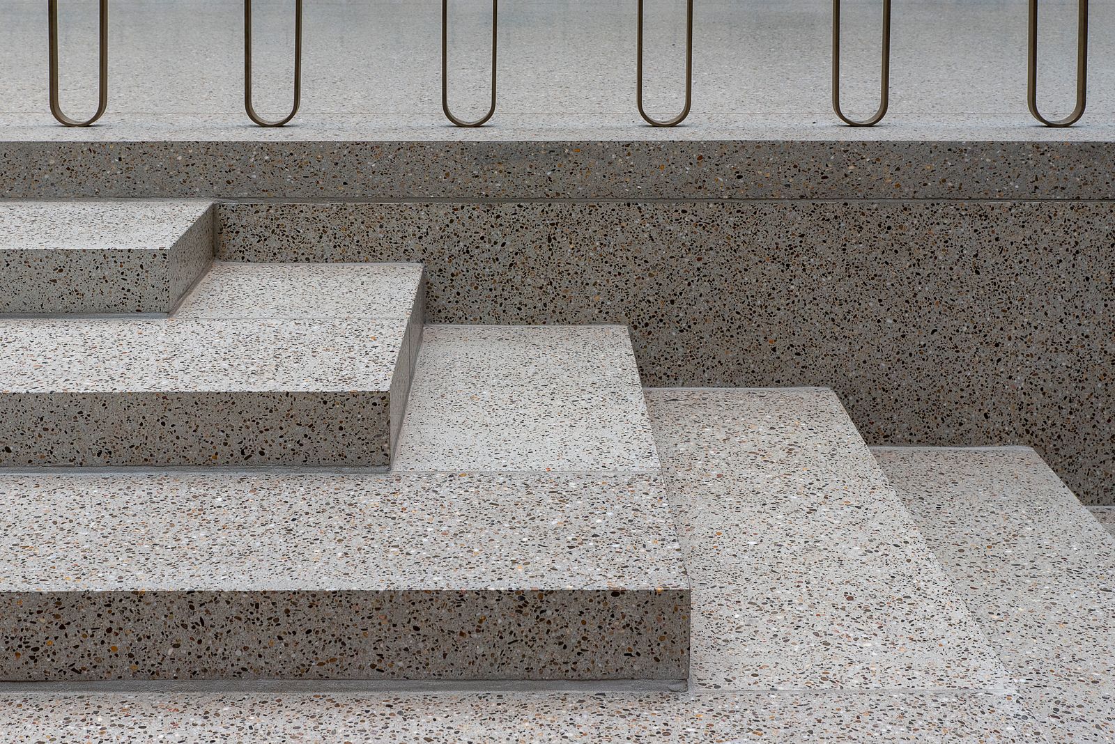 Minimal terrazzo steps outside a modern building — photo by Jan van der Wolf on Pexels