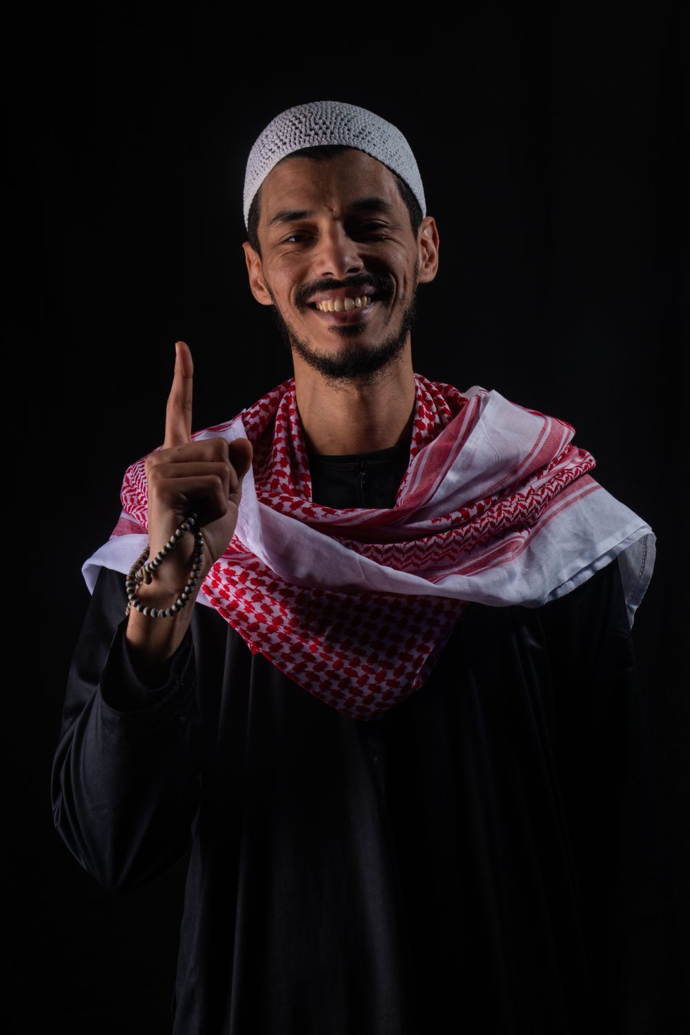 Smiling Man in Traditional Middle Eastern Attire · Free Stock Photo