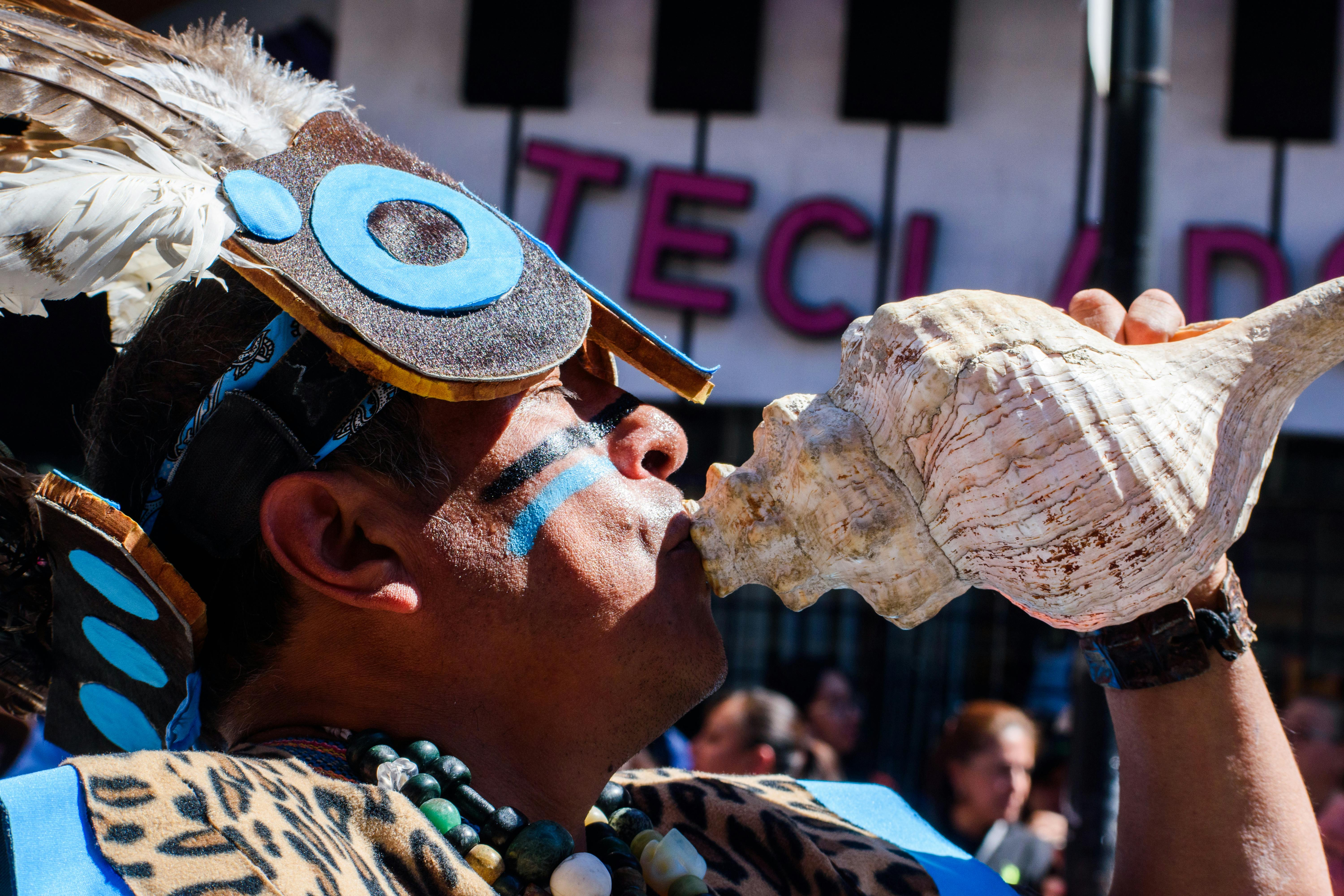 Traditional Mexican Festival Performer Blowing Conch
