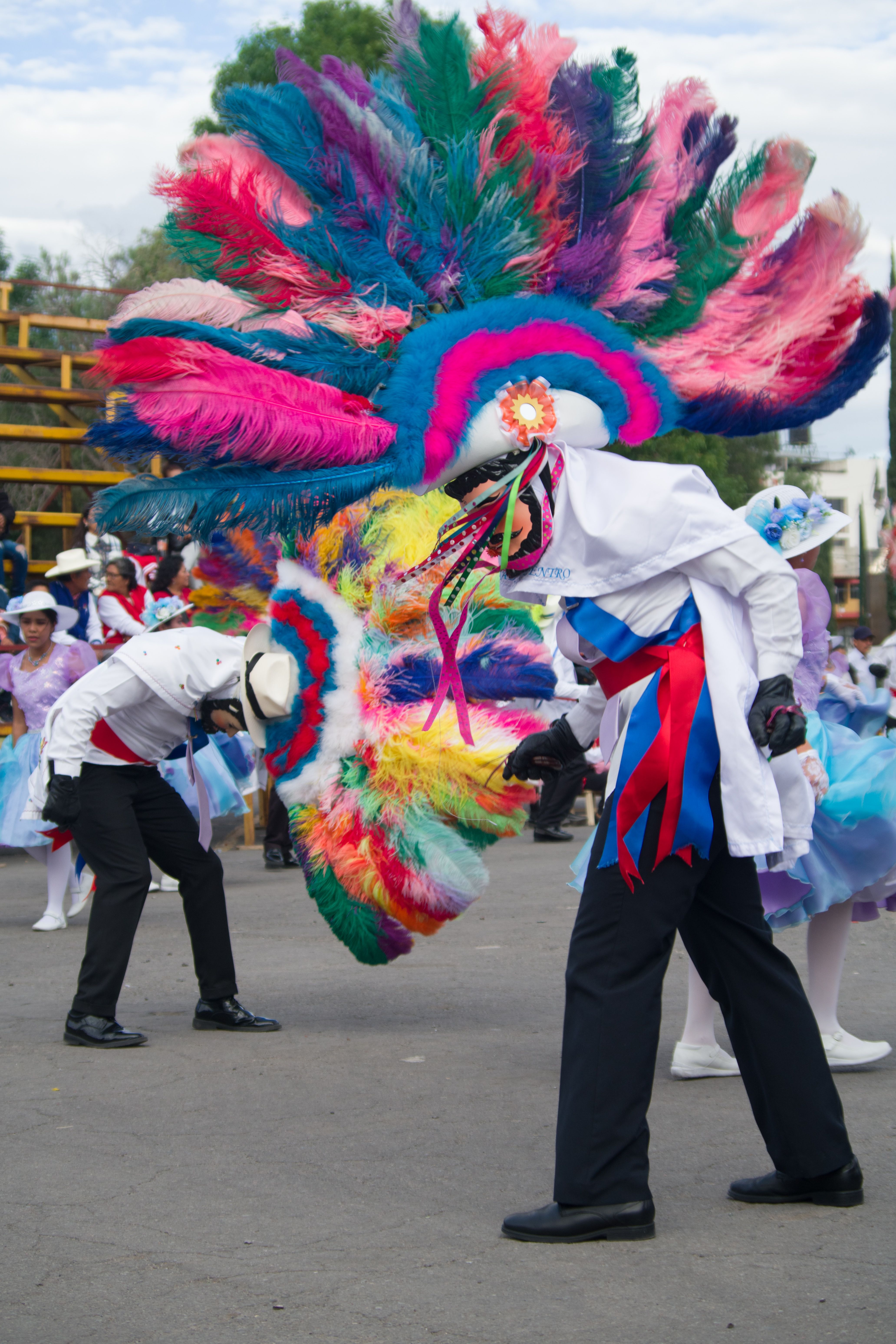 Colorful costumes and lively dancers celebrate the annual carnival in Tlaxcala, Mexico.