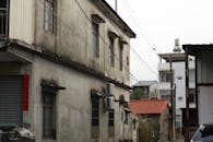 Rustic Urban Alley View with Weathered Buildings