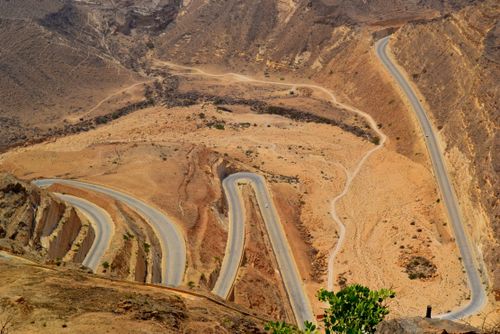 Free Captivating view of a winding road through Dhofar's arid mountains, Oman. Stock Photo