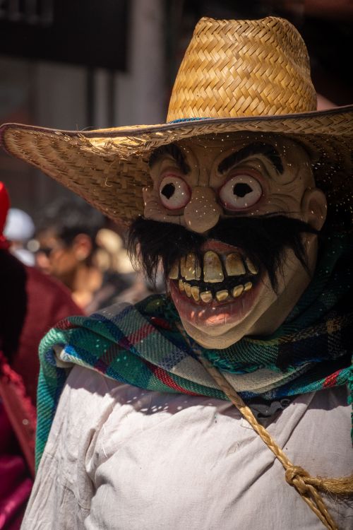 Free A vibrant carnival scene with a traditional mask in Pachuca, Mexico, showcasing cultural celebration. Stock Photo