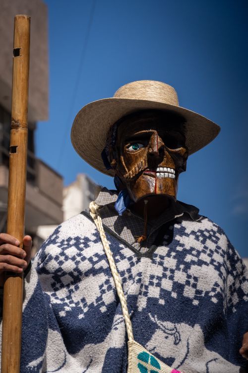 Free A person in a cultural festive costume with a mask, photographed outdoors in Pachuca, Mexico. Stock Photo