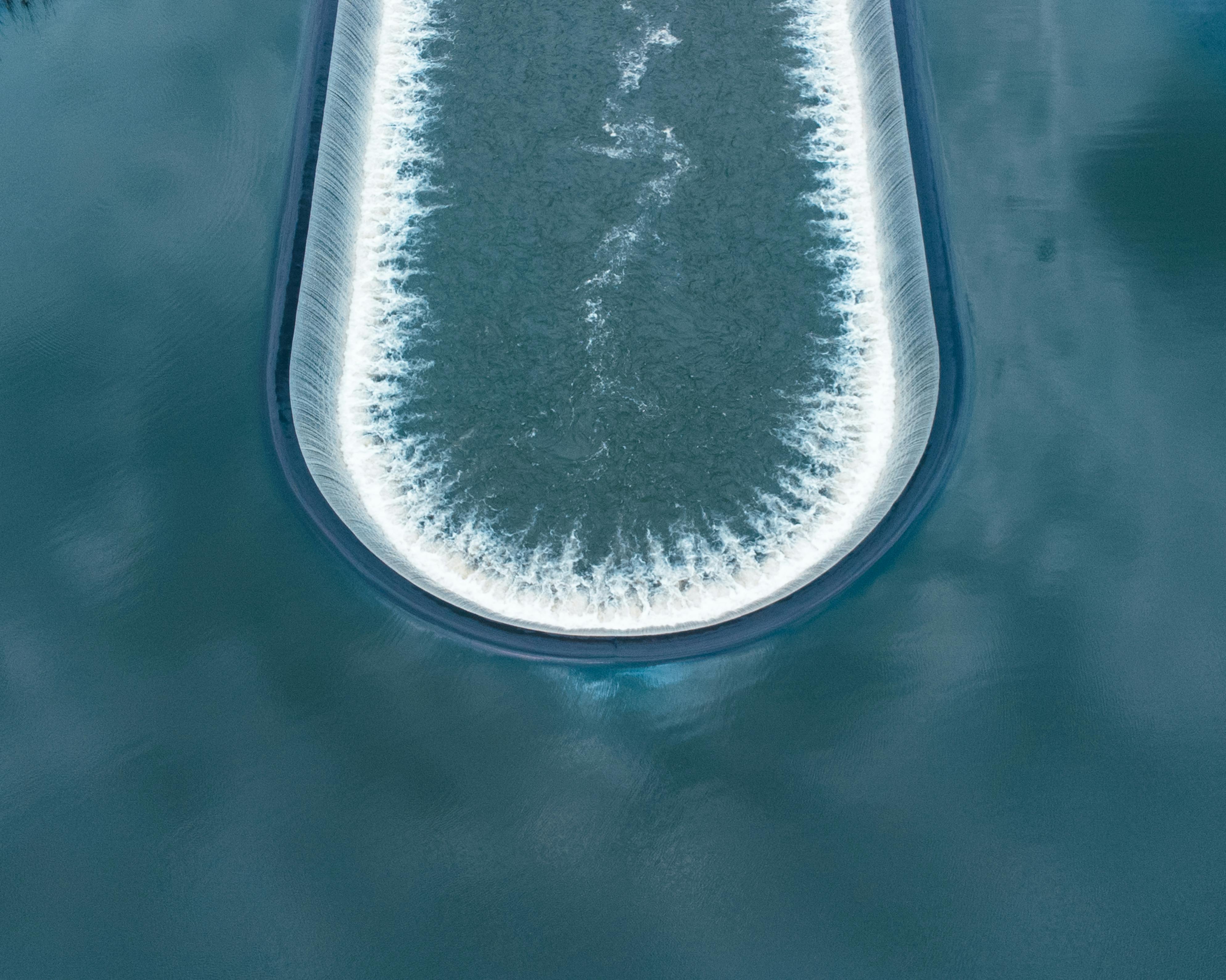 Free Aerial shot of a water reservoir overflow in Suleja, Nigeria, showing refreshing cascade. Stock Photo