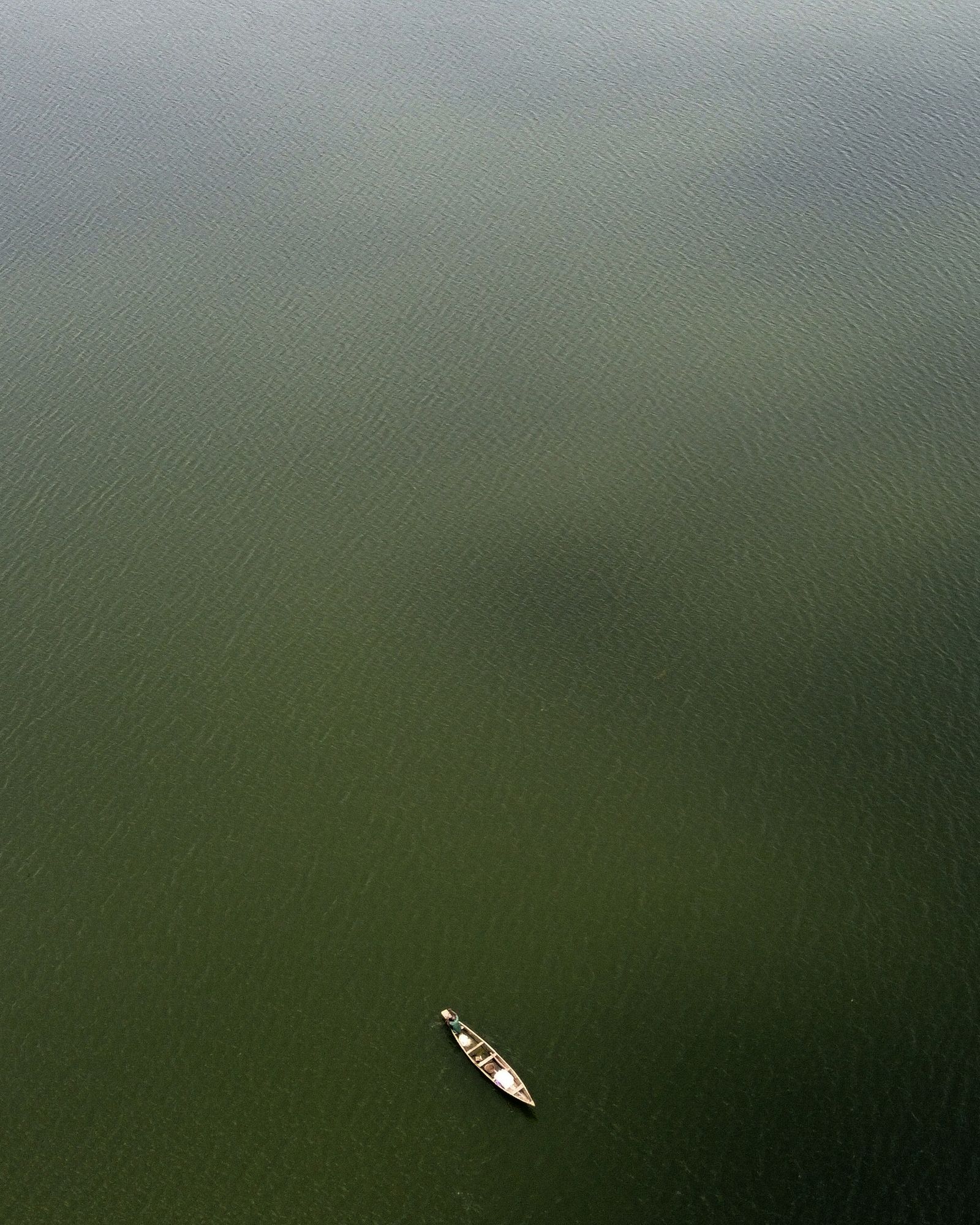 Person on Boat in Birds Eye View · Free Stock Photo