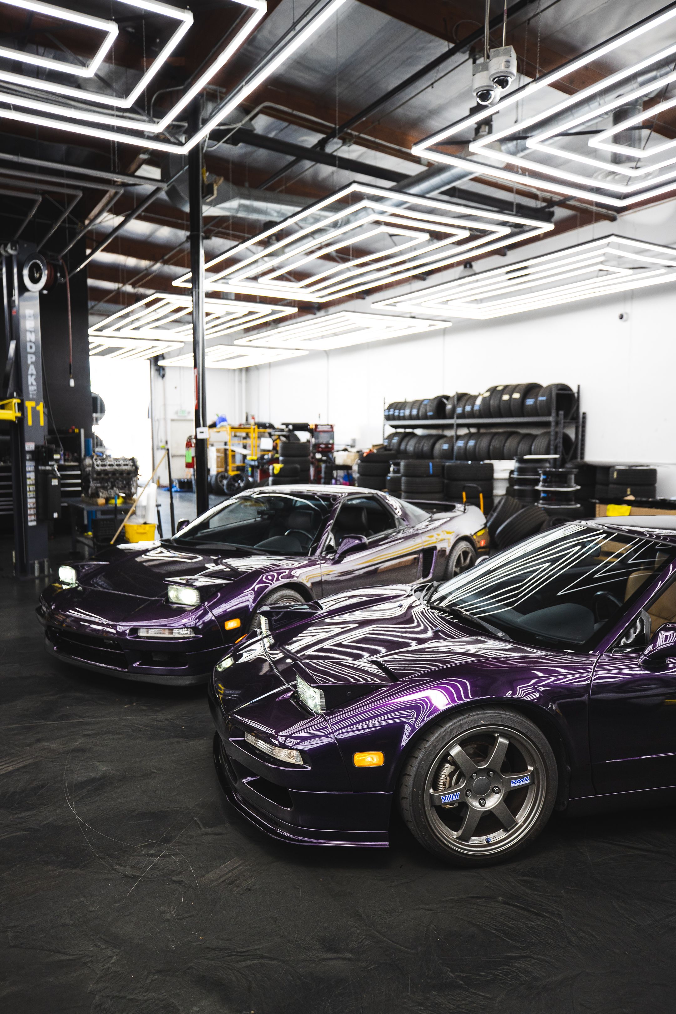 Luxury Sports Cars in a Modern Garage Setting · Free Stock Photo