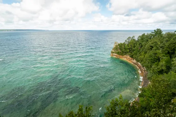 Miners Castle formation above turquoise Lake Superior water at Pictured Rocks
