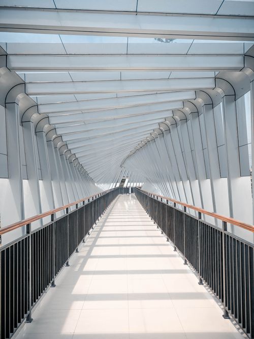 Free Explore the sleek design of a futuristic steel bridge interior in Jawa Tengah, Indonesia. Stock Photo
