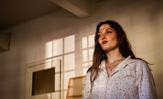 Window-light interior portrait — Kari Alfonso on Pexels