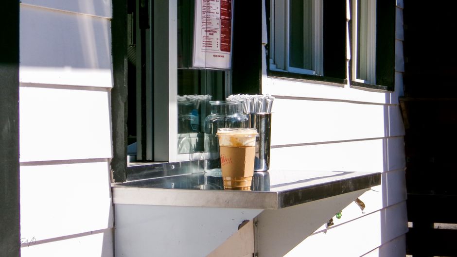iced coffee americano takeout cup coffee shop counter