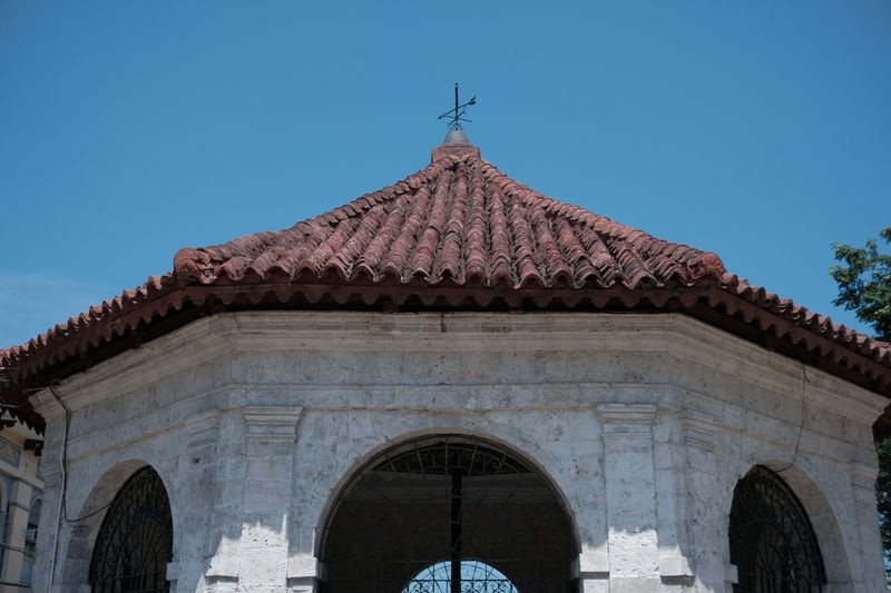 Octagonal stone pavilion housing Magellan's Cross in Cebu