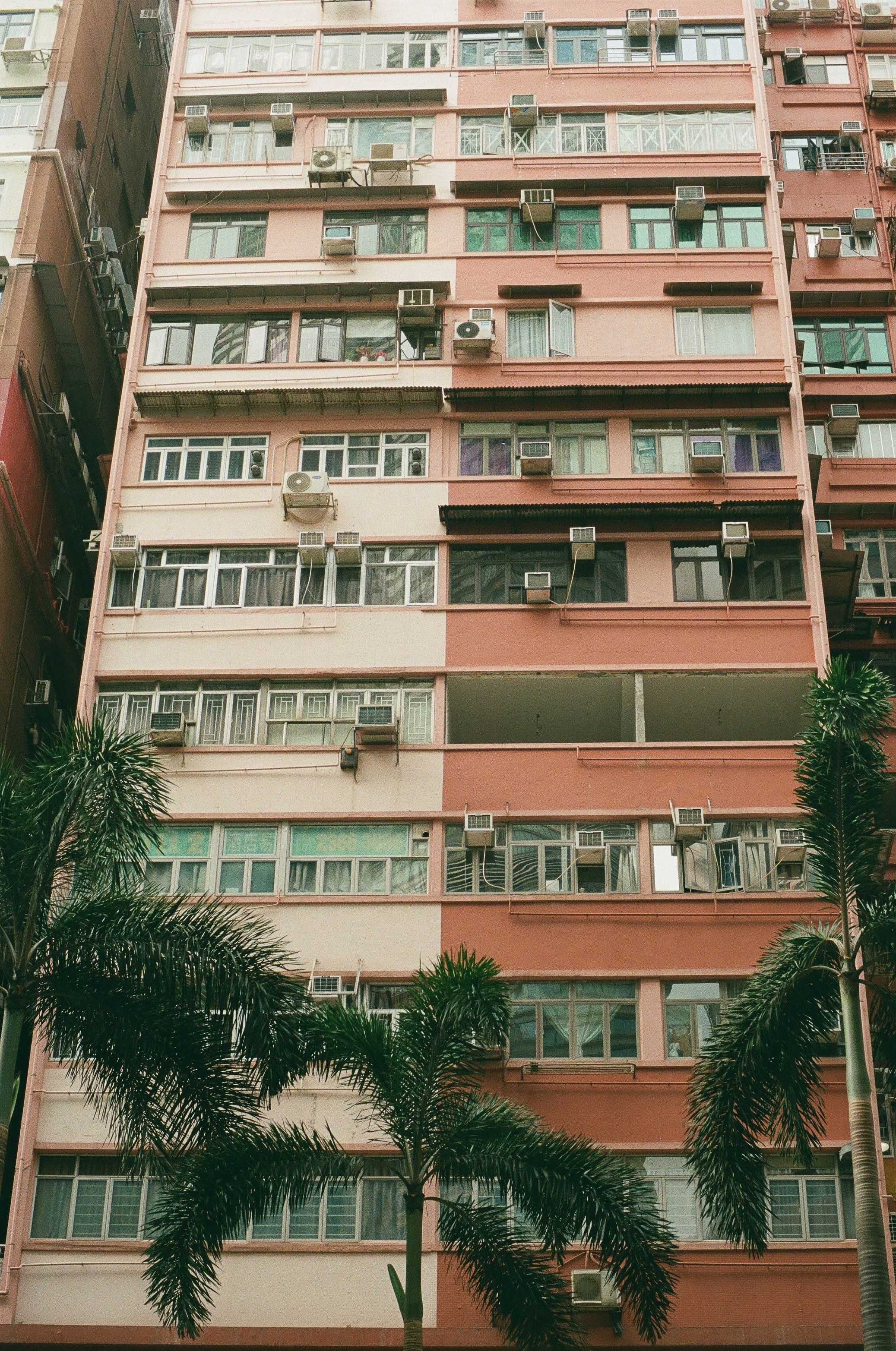 High-Rise Apartment Building with Air Conditioners · Free Stock Photo
