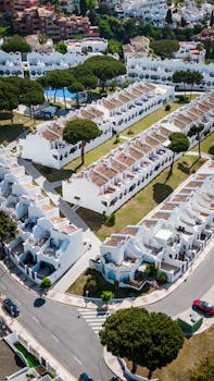 Stunning aerial view of traditional whitewashed villas in Marbella, Andalucía.