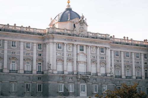 Free Close-up of the Royal Palace of Madrid. Captivating facade in soft daylight, showcasing classic architecture. Stock Photo