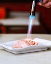 Chef Using Torch to Prepare Salmon Sashimi