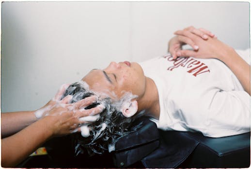 A person enjoying a soothing hair wash in a salon setting, conveying relaxation.